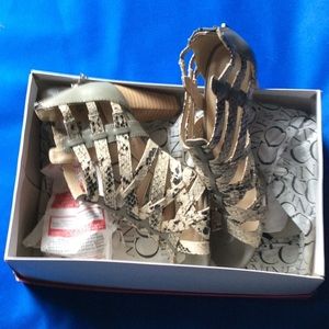 Snake skin peep toe heels